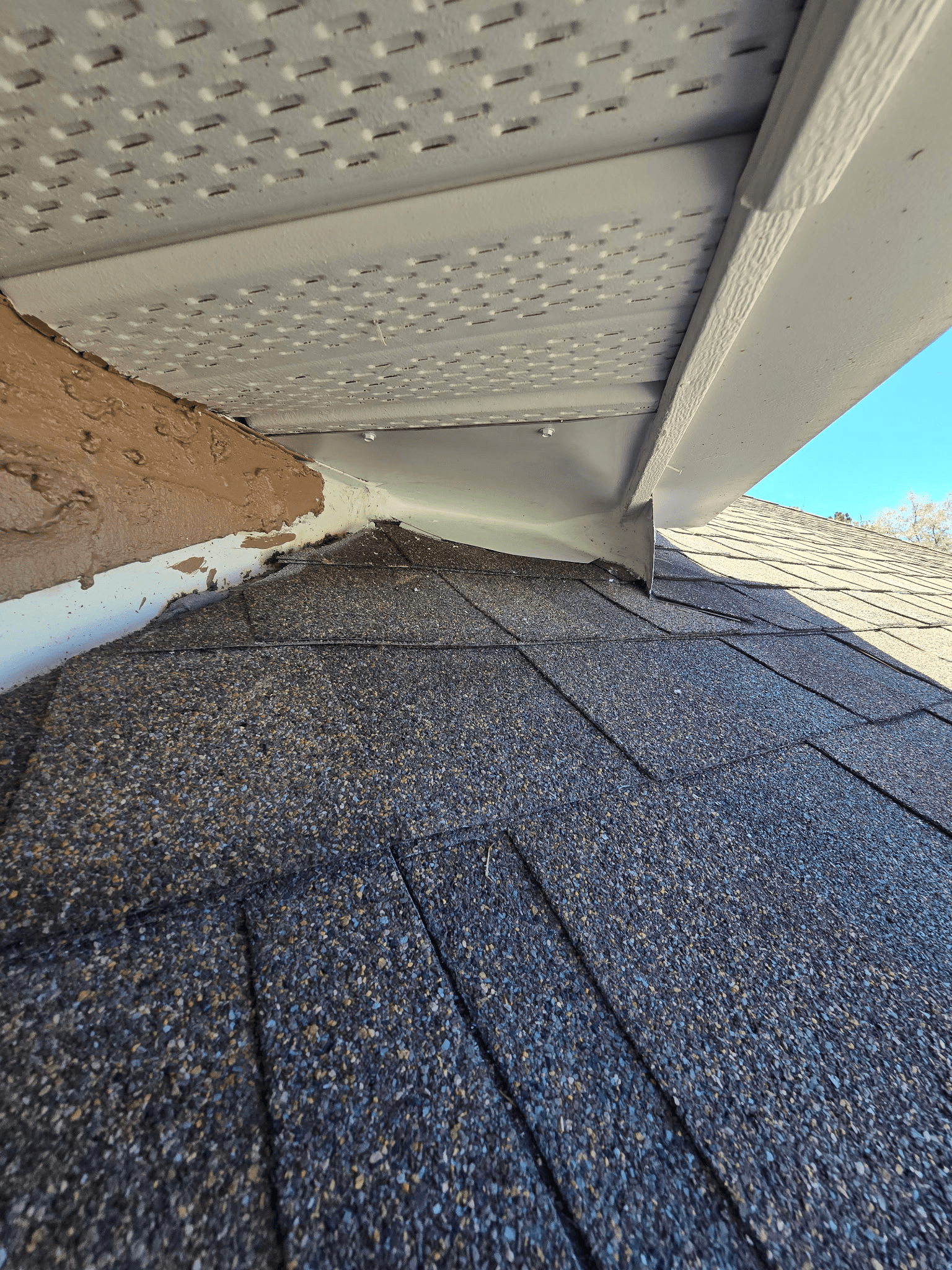 Soffit sealed with fabricated aluminum — entry point permanently closed